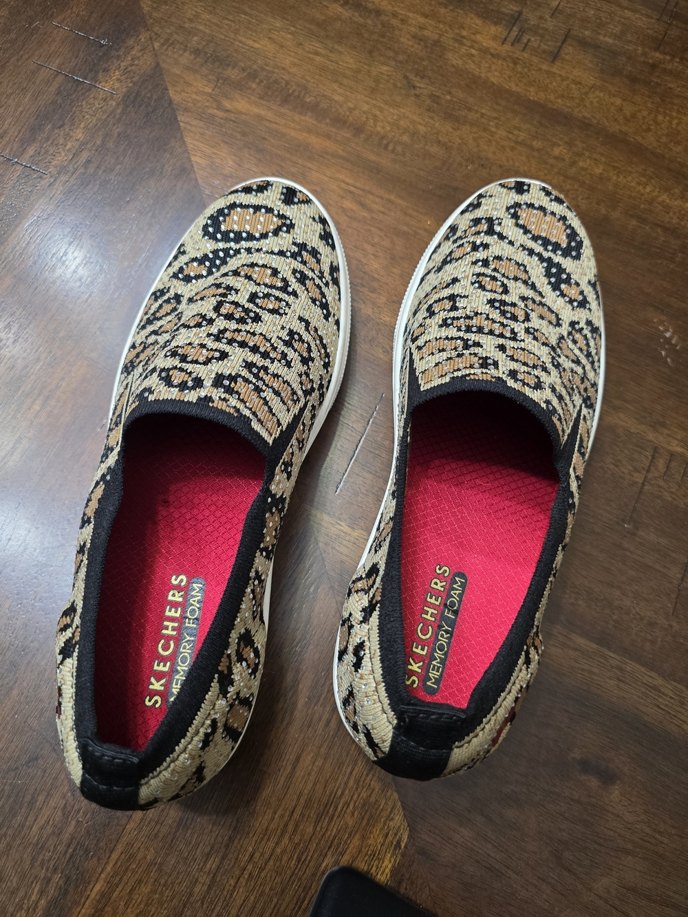 Skechers Women's Slip-On Sneakers in Tan and Black Leopard Print